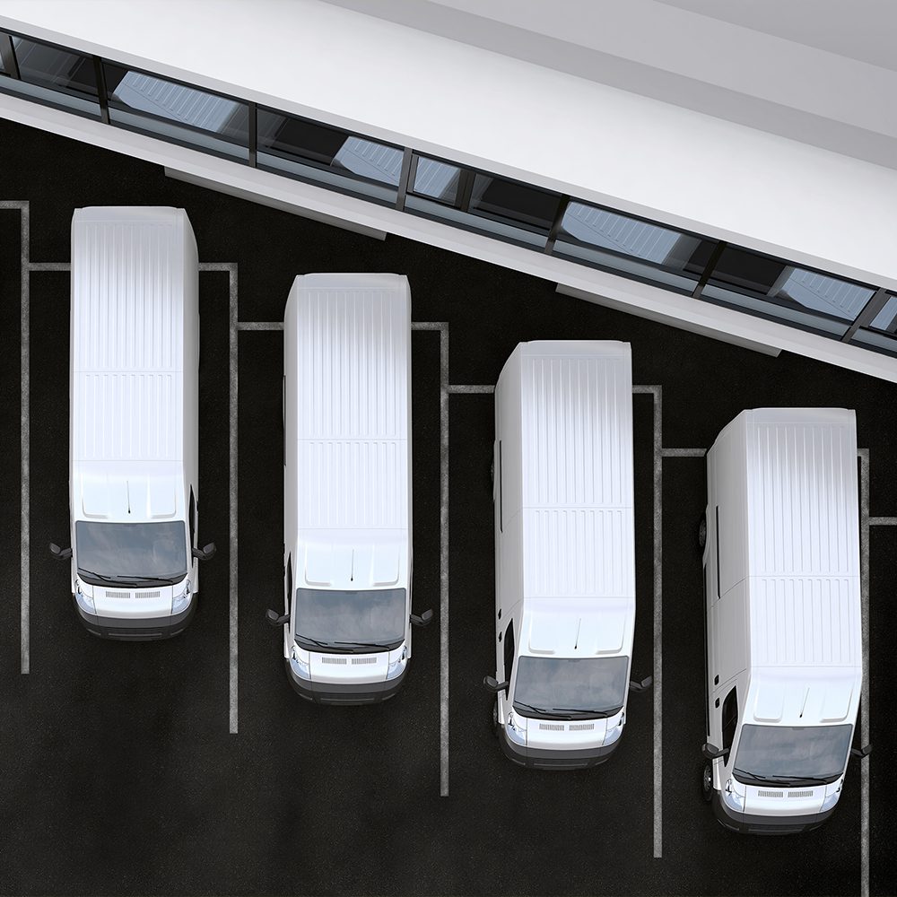 A row of parked service vans